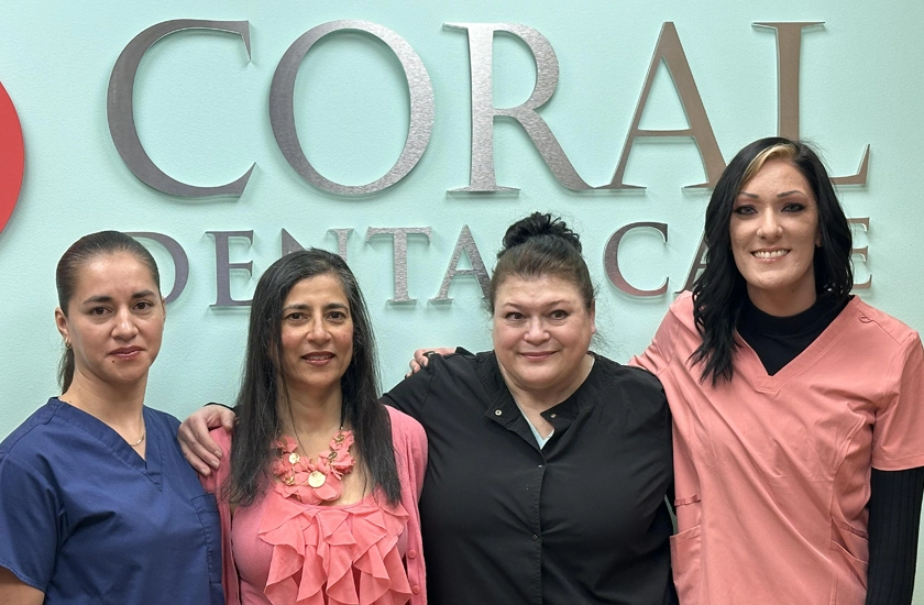 Dr. Anu Isaac and her team at Coral Dental Care Salem, MA